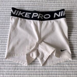 White 5” Nike Pro spandex shorts